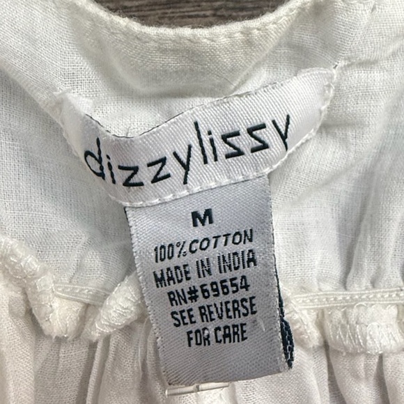 Elegant White Midi Dress with Orange Floral Accents - Picture 8 of 8